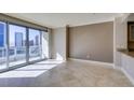 Spacious living area with large windows offering stunning city views at 222 Karen Ave # 1604, Las Vegas, NV 89109