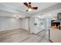 Open concept living and kitchen with wood-look flooring at 3152 S Eastern Ave # 26, Las Vegas, NV 89169