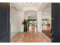 Spacious foyer with tile floors and views into the living areas at 4649 Bird View Ct, Las Vegas, NV 89129