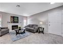 Bright living room with fireplace, offering a relaxing atmosphere at 6657 W Tropicana Ave # 201, Las Vegas, NV 89103