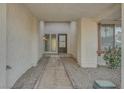 Covered entryway with tile flooring and a pathway to the front door at 3849 Boca Chica Ave, Las Vegas, NV 89120