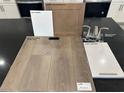 Bathroom material samples, including white quartz countertops and nickel faucet at 4205 Yucca Brevi Ave, Las Vegas, NV 89139