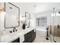 Elegant bathroom with double vanity, soaking tub, and a walk-in shower at 5904 Willowcreek Rd, North Las Vegas, NV 89031