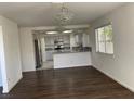 Bright kitchen with stainless steel appliances and granite countertops at 8416 Shore Breeze Dr, Las Vegas, NV 89128