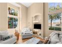 Cozy living room with hardwood floors and ample natural light at 8437 Sluman Ct, Las Vegas, NV 89128