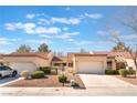 Charming single-story home featuring a well-maintained front yard with desert landscaping and a two-car garage at 8617 Prairie Hill Dr, Las Vegas, NV 89134