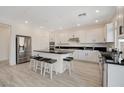 Modern kitchen with stainless steel appliances and island at 8749 Black Cordon Rd, Las Vegas, NV 89139