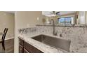 Stainless steel sink with granite countertop and modern faucet at 950 Seven Hills Dr # 2413, Henderson, NV 89052