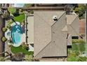 Aerial view showing home's layout, pool, and landscaping at 9523 Castillana Ct, Las Vegas, NV 89147