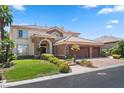 Two-story home with stone accents and three-car garage at 9523 Castillana Ct, Las Vegas, NV 89147