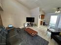 Spacious living room with recessed lighting and a flat-screen TV at 2148 Pebble Creek Ln, Laughlin, NV 89029