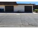 Two-car garage with dark brown doors and a spacious driveway at 2732 Heritage Ct # 0, Las Vegas, NV 89121