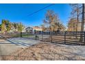 View of the property's gated entrance with a long driveway at 5353 Dorrell Ln, Las Vegas, NV 89131