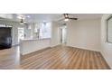 Modern kitchen with white cabinets and a breakfast bar at 1408 Palm St, Henderson, NV 89011