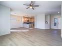 Open living area with light flooring and ceiling fan at 1510 Fieldbrook St, Henderson, NV 89052