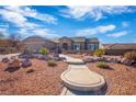 Single-story home with landscaped yard and walkway at 1645 Warrington Dr, Henderson, NV 89052