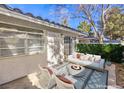 Cozy patio with fire pit and seating area, perfect for relaxing at 2132 Petersham Ct # D, Las Vegas, NV 89108