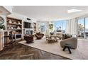 Bright living room featuring hardwood floors and city views at 2857 Paradise Rd # 2203, Las Vegas, NV 89109