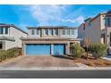 Three-car garage, stone accents, and landscaping highlight this inviting home exterior at 358 Terrill Ave, Las Vegas, NV 89183