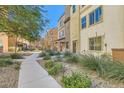 Landscaped pathway leading to townhome community at 4650 Ranch House Rd # 42, North Las Vegas, NV 89031