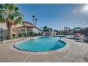 Inviting community pool with lounge chairs and sunny patio at 5242 Dickens Dr, Las Vegas, NV 89119