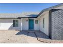 Inviting teal front door adds a pop of color at 5264 Lookout St, Las Vegas, NV 89120