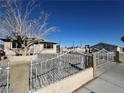 House exterior with gated entrance and landscaping at 1152 Miller Ave, Las Vegas, NV 89106