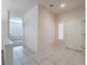 Bright entryway with tile floors and neutral color palette at 1803 Eagle Village Ave, Henderson, NV 89012