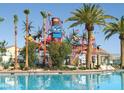 Community water park featuring colorful slides, playful structures, and a refreshing swimming pool at 334 Sea Rim Ave, Las Vegas, NV 89148