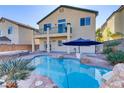 Stunning pool and spa with a large patio and backyard at 5536 Valensole Ave, Las Vegas, NV 89141