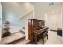 Welcoming entryway showcasing staircase and ample natural light at 6521 Taffrail Ave, Las Vegas, NV 89118