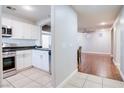 Modern kitchen featuring stainless steel appliances and white cabinets at 9009 Careful Canvas Ave, Las Vegas, NV 89149