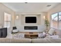 Living room features a fireplace and hardwood floors at 2892 Rothesay Ave, Henderson, NV 89044