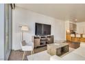 Bright living room with modern furniture and city views at 3726 Las Vegas Blvd # 2310, Las Vegas, NV 89158