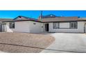 Updated single-story home features a modern facade and fresh landscaping at 4173 Crater St, Las Vegas, NV 89122