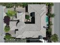 Aerial view of an estate showing the roof, pool, and landscaping of the property at 4450 Palisades Canyon Cir, Las Vegas, NV 89129