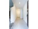 Bright and airy entryway with tile flooring and staircase at 671 Anemone Ln, Henderson, NV 89015