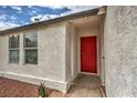 Newly painted red front door with updated entryway at 145 Hancock St, Las Vegas, NV 89110