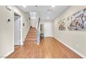 Spacious entryway with hardwood floors and staircase at 3257 Aiken St, North Las Vegas, NV 89032