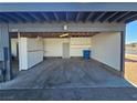 Attached garage with ample storage space and overhead lighting at 4017 Danford Pl, Las Vegas, NV 89102