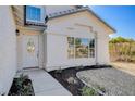 Inviting front entrance with walkway and landscaping at 5236 Woodlawn Ln, Las Vegas, NV 89130