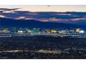 Stunning nighttime view of Las Vegas skyline at 591 Overlook Rim Dr, Henderson, NV 89012