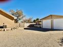 Detached two-car garage with gravel driveway at 425 Ross Ave, Overton, NV 89040