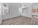 Bright living room with hardwood floors and high ceilings at 5445 Tallulah Falls St, North Las Vegas, NV 89081