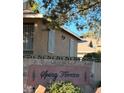 Neighborhood sign for Spring Terrace featuring the community name and decorative pine trees at 3891 Terrazzo Ave, Las Vegas, NV 89115