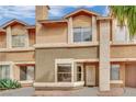 Multi-Gathering home featuring stucco siding, complemented by desert landscaping and a covered front entry at 3891 Terrazzo Ave, Las Vegas, NV 89115