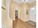 Warm and welcoming foyer with a coat closet and stylish decor at 928 Carmel Shores Dr, Las Vegas, NV 89128