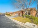 Street view of houses with similar architectural style at 10840 Villa Torre St, Las Vegas, NV 89141