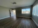 Bright and airy living room featuring wood-look floors at 2410 Poplar Ave, Las Vegas, NV 89101