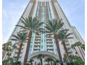 High rise building exterior with palm trees in front at 2777 Paradise Rd # 3701, Las Vegas, NV 89109